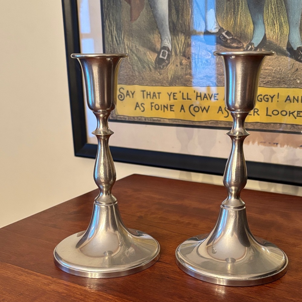 A pair of Woodbury Pewterer colonial style candlesticks